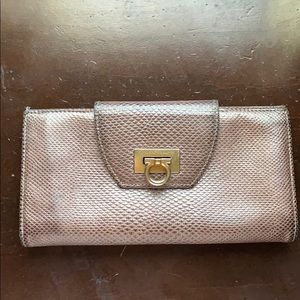 Ferragamo mauve python wallet